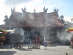 Massive incense sticks burn outside Chinese temple