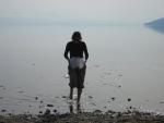 Heather collects some ice from Lake Baikal